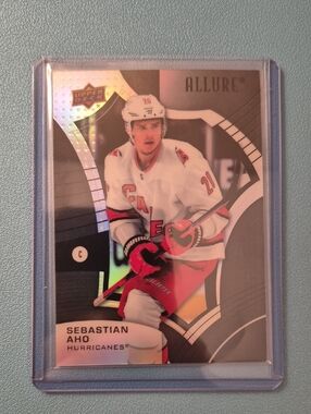 Allure Sebastian Aho Black Rainbow Hockey Card - Pink & Black